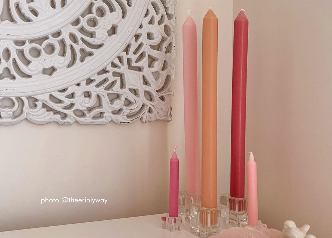 tall pink and orange display candles