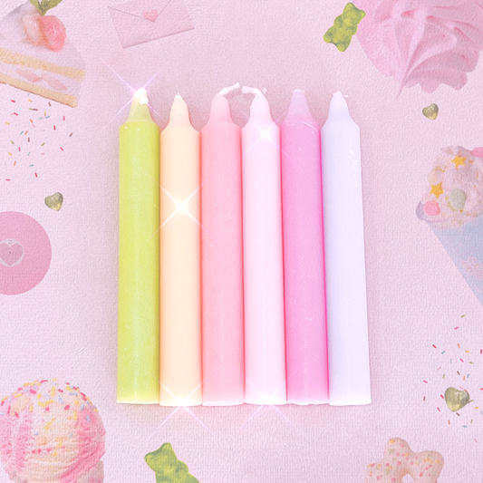 6 wish candles in a range of pink, yellow and green colours